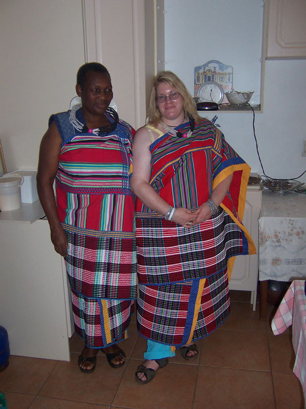 Becky with Takalani her host in traditional Venda Dress.	