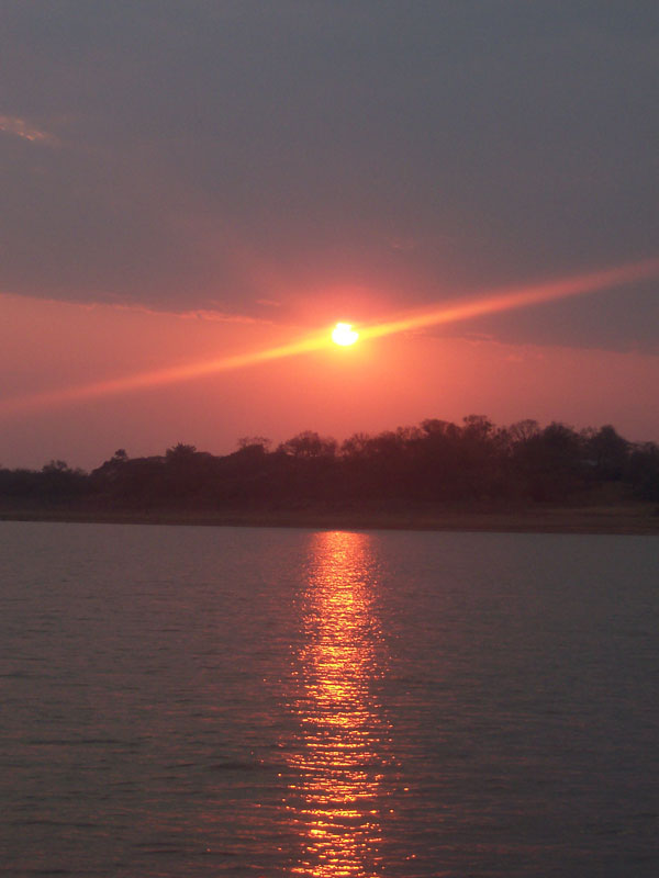 Typical African Sunset. On the Albassini Dam.	